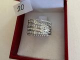 a ring in a red box with a price tag on it