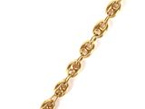 a close up of a gold chain on a white background