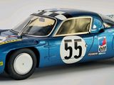 a model of a blue race car on a white surface