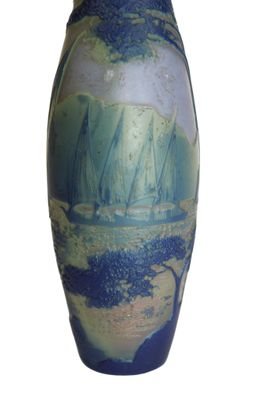 a blue vase with a painting on it on a white background