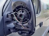 a picture of a car door handle with wires attached to it