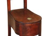 chair made of wood with a wooden seat and back rest