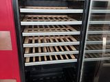 an image of a refrigerator with many shelves full of food