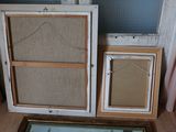 two old windows and a window pane on the floor