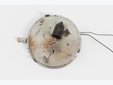 a small metal object with a wire attached to it