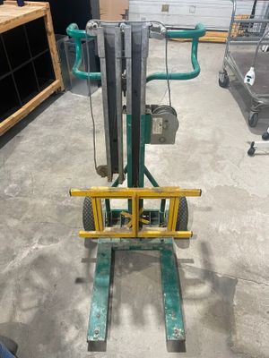 an image of a fork lift truck in a warehouse