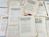 a pile of old books sitting on a table