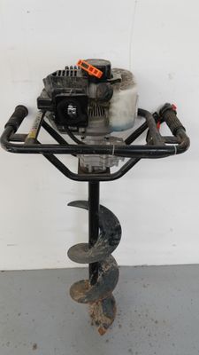 a close up of a small machine on a stand in a room