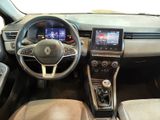 the interior of a car with a steering wheel, dashboard, and dashboard controls