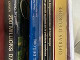 many books that are sitting in a box together