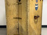 an old suitcase sitting on the floor in a room