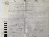 a piece of paper with a pen and ink drawing on it