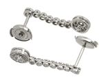 two pairs of silver cufflinks with diamonds on them on a white background