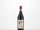 a bottle of red wine sitting on top of a table