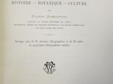 an open book with a black and white image of a rose on it