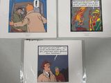 two comics are being displayed on a table in front of a person