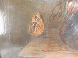 a painting of a butterfly sitting on a table next to a vase of flowers
