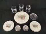 a lot of glassware on a table with a black background
