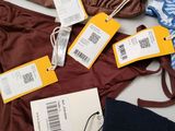 a lot of clothes that are on a table