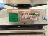 a close up of a scale with a price tag on it