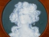a picture of a picture of a woman with flowers in her hair