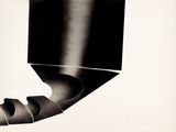 a black and white photo of a black object on a white background