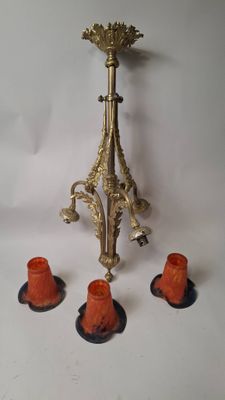 three candles that are sitting on a table