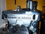 an image of a coffee machine sitting on a kitchen counter