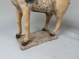 a statue of a horse with a rider on its back