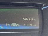 a picture of a car dashboard showing the speed of the car