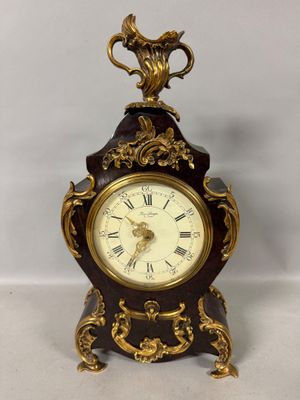 a clock that is sitting on top of a table