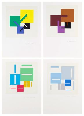 four different colored squares are arranged on a white surface