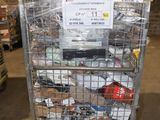 a metal cart with many items in it in a warehouse