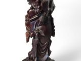 an image of a statue of a woman holding a child