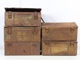 three old metal boxes stacked on top of each other
