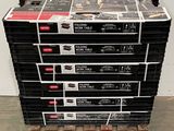 boxes stacked on top of each other on a pallet in a warehouse