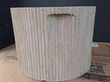 a cardboard planter sitting on top of a cardboard box