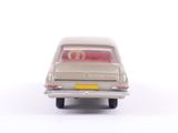 a toy car that is sitting on a white surface