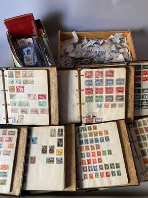 a lot of stamps on the pages of a book