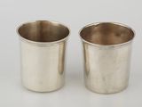 pair of silverplated cups with handles and handles