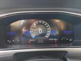 the dashboard of a car with a digital display on it
