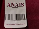 a close up of a label on a red shirt that says anais
