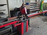 a picture of a machine that is working on a piece of metal