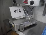 a machine with a price tag on it in a kitchen