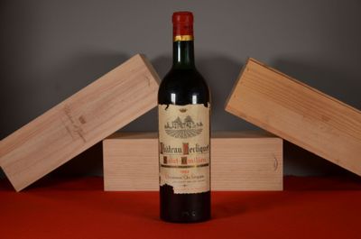 a bottle of wine that is sitting on a table