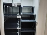 an image of an empty room with shelves and a door