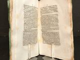 an open book that is sitting on a table