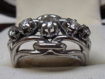 an image of a ring with diamonds on it