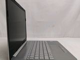 an open laptop computer sitting on top of a white table