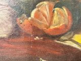 a painting of an orange on a table next to a vase of flowers